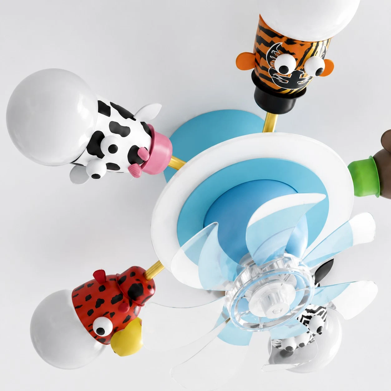 Close view of the animal lamp arms and fan center