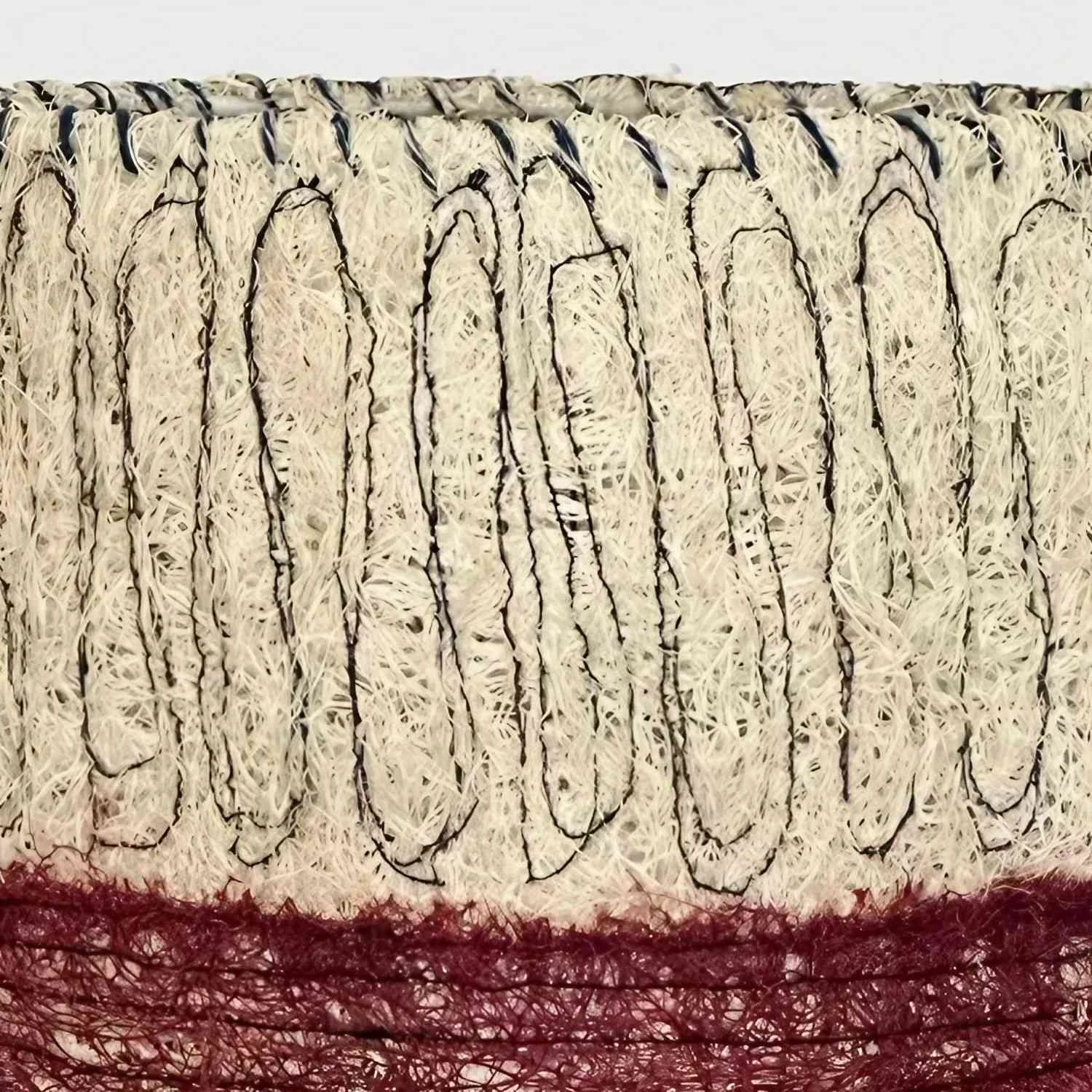 Dettaglio ravvicinato della trama della fibra di luffa intrecciata a mano